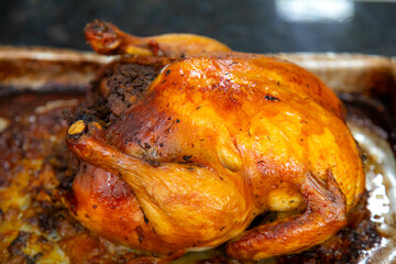 Rustic roast chicken stuffed with farofa