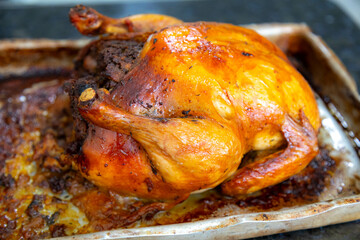 Rustic roast chicken stuffed with farofa