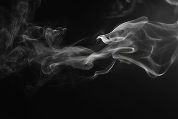 Fototapeta premium Abstract white smoke swirls against a black background, creating a dynamic and ethereal effect.