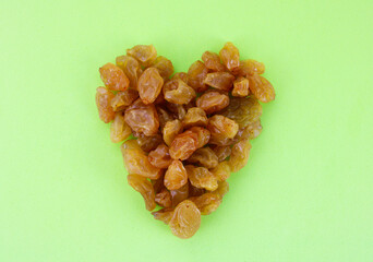 Tasty sweet raisins that form a heart