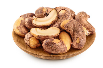 cashew nut with shell in wooden bowl isolated on white background