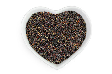 black quinoa in ceramic bowl isolated on white background. Top view. Flat lay