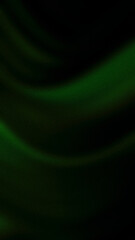 Dark abstract gradient featuring flowing waves of deep green hues and grainy texture in a vertical 4K format. Ideal for sleek, modern backgrounds and banners
