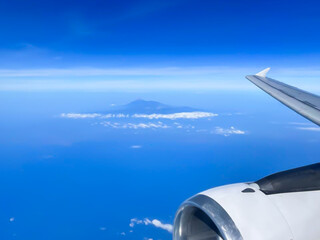 sky view from airplane window, blue sky