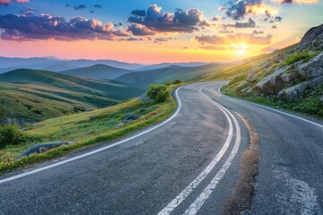Naklejka premium Mountain road at colorful sunset in summer. Beautiful curved roadway, rocks, stones, blue sky with clouds. Landscape with empty highway through the mountain pass in spring. Travel
