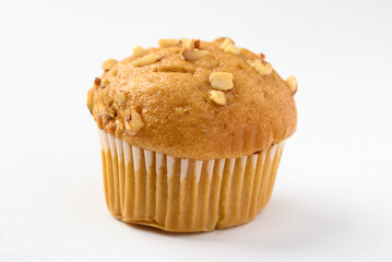 Vanilla almond muffin on white background