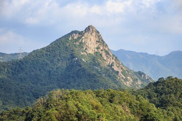 Majestic View of Lion Rock in Hong Kong Under a Clear Sky