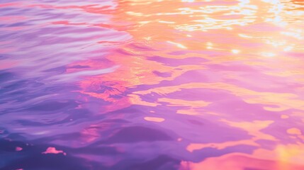 Golden hour sunset with colorful reflections on a calm lake, soft hues of pink and purple.
