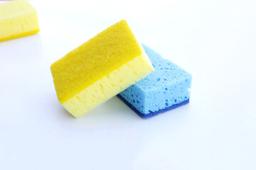 Cleaning kitchen dishwashing sponge. Copy space