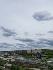 Fototapeta premium High Angle View of Historical Sheffield City Which is Located at English county of South Yorkshire United Kingdom. Aerial View of City Was Captured with Drone's Camera From High altitude on April 29th
