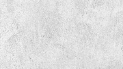 Textured close-up of a light gray concrete wall featuring a subtle crack running diagonally across the surface.