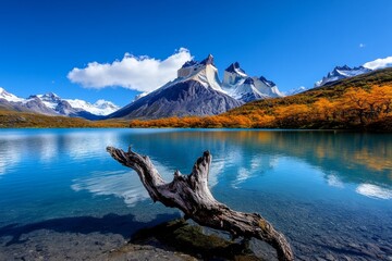 Obraz premium Watercolor painting of Torres del Paineâ€™s jagged peaks, with soft washes of blue and orange blending into the sky and lakes, capturing the natural beauty of Patagonia