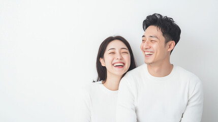 Obraz premium Smiling Couple's Intimate Connection: A heartwarming and genuine portrayal of a couple's shared joy and laughter, symbolizing love, happiness, and companionship. 