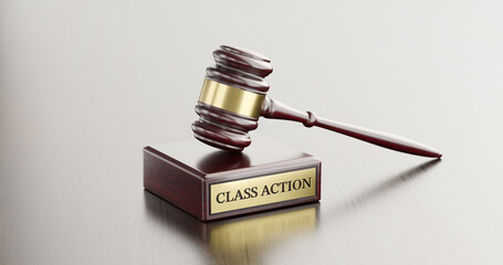 Class Action: Judge's Gavel as a symbol of legal system and wooden stand with text word