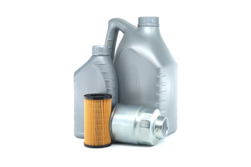 Automotive oil container and filters isolated on white background with focus on maintenance supplies