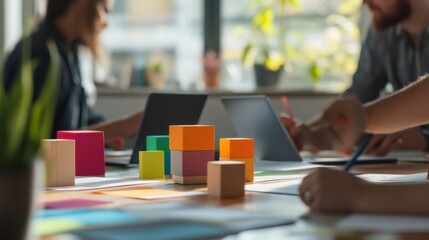 A collaborative workspace with designers brainstorming using blocks for ideation, Blocks arranged for creative thinking sessions, Design thinking style