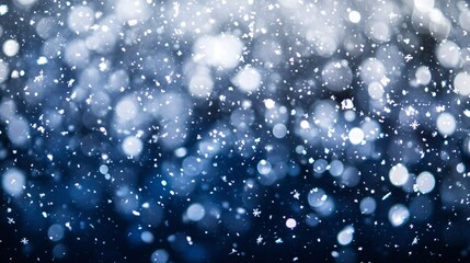 Obraz premium Abstract blue background with snowflakes and bokeh lights.