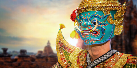 Fototapeta premium Khon Masked Dance in Thailand, a UNESCO Intangible Cultural Heritage with Chai Wattanaram Temple, a UNESCO World Heritage Site in Ayuthaya.