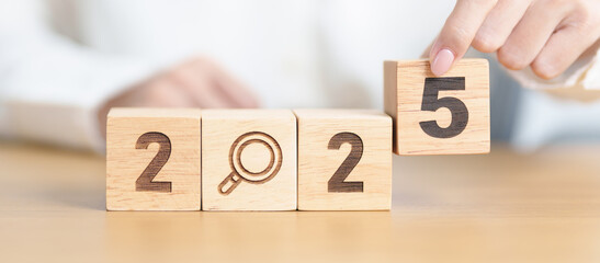 2025 block with magnifying glass icon. SEO, Search Engine Optimization, hiring , Advertising, Idea, Strategy, marketing, Keyword, Content and New Year start concepts