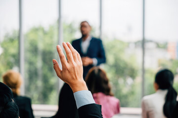 Seminar attendees eagerly participate in the Q and A raising hands to ask questions and fostering a...
