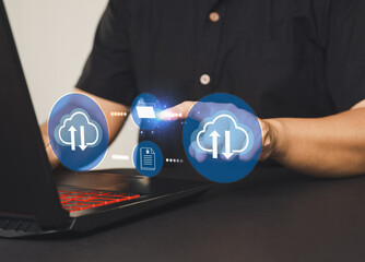 Virtual cloud computing and data transfer icons hovering over a laptop screen.