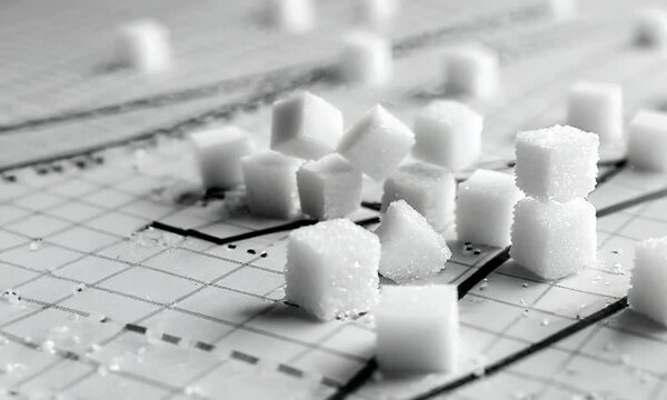 Sugar Cubes on Financial Graph - Conceptual Image Representing Market Trends and Economic Data Analysis