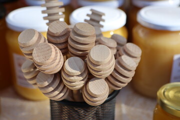 Explore Wooden Honey Dippers available in a delightful Market Setting, perfect for various uses