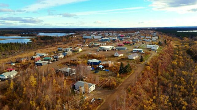 A Serene View of the Small Community of Fort McPherson in the Northwest Territories, Canada - Drone Flying Forward