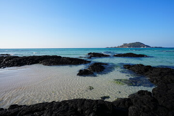 rock beach and clear water