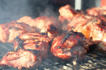 Deliciously Grilled Chicken on a BBQ Grill Infused with a Tantalizing Smoky Flavor