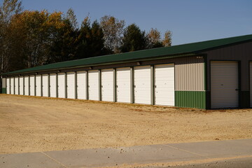 Green and Tan storage units holding the owner's property.