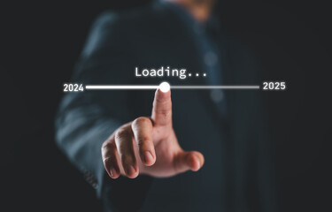 Businessman touching to downloading bar to change 2024 to 2025 year for change and preparation new business year concept.