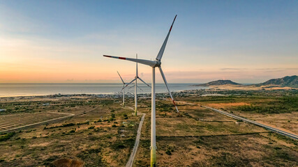 Landscape with Turbine Green Energy Electricity, Windmill for electric power production, Wind turbines generating electricity on field at Phan Rang, Ninh Thuan, Vietnam. Clean energy concept.