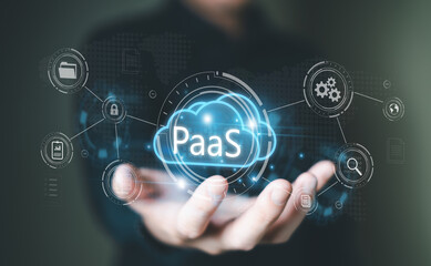 Hand of business people press the button on Cloud platform as a service PaaS to deploy application...