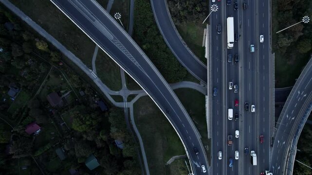 Forming of traffic jam on highway road in Poland, aerial drone top down view