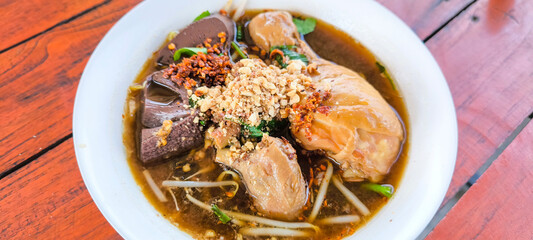Chicken noodles in a bowl, Thai style