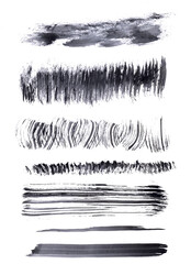 watercolour strokes with a figurative brush on white paper