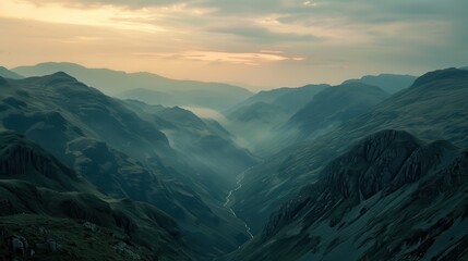 Panoramic Mountain Range at Sunset Over Deep Valley