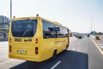 Dubai school bus, yellow arabic school bus © Sergey