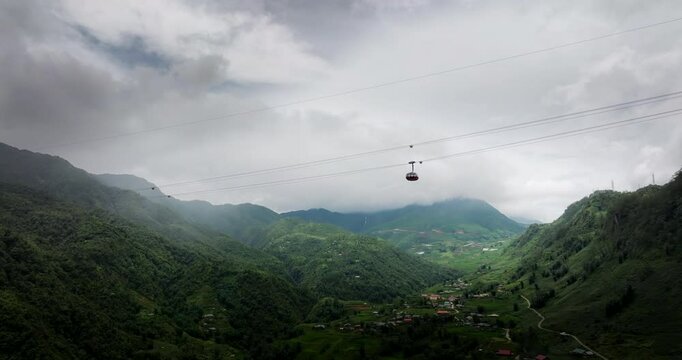Fansipan Sun World cable car gondola ascending towards summit, Hoang Lien. Drone