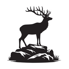 Silhouette of a deer standing on rocks with grass.