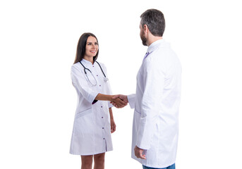Fototapeta premium doctor handshake with nurse. healthcare insurance deal. medicine and healthcare. medical deal between two colleague isolated on white. promotion deal in medicine. Exclusive deal
