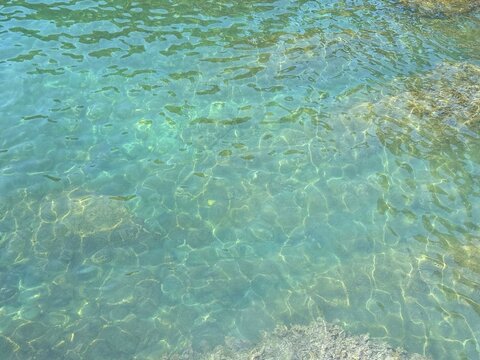 Amazing sea clear transparent water calm surface