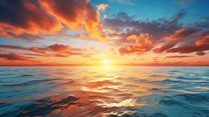 Obraz premium The sun setting on the horizon, casting golden hues over the calm sea and blue sky