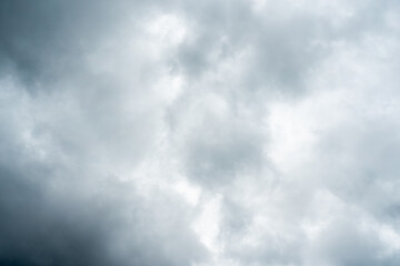 Dark dramatic storm cumulus clouds in autumn. An impending storm, hurricane or thunderstorm. Bad weather.