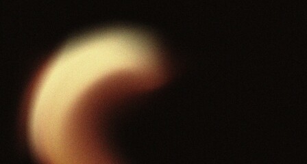 Golden yellow brown color on black background, grainy textured wallpaper, blurry art