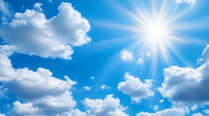  A bright blue sky with clouds and the sun shining in the middle, featuring a radiant sunburst