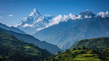Obraz premium breathtaking view of green hills and towering peaks under clear blue sky, showcasing beauty of nature and majesty of mountains