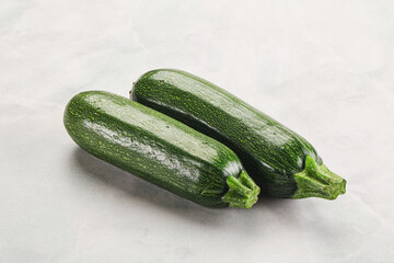 Raw green ripe zucchini vegetable