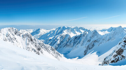 Obraz premium vast snowy mountain range under clear blue sky showcases breathtaking beauty of nature. pristine snow and majestic peaks evoke sense of tranquility and wonder